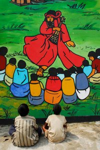 Baul è la canzone popolare tradizionale in Bangladesh. Ci sono molti gruppi di cantanti che si esibiscono in diversi villaggi. Questa immagine è un dipinto accanto a un luogo archeologico. Alcuni bambini sono si da Unknown